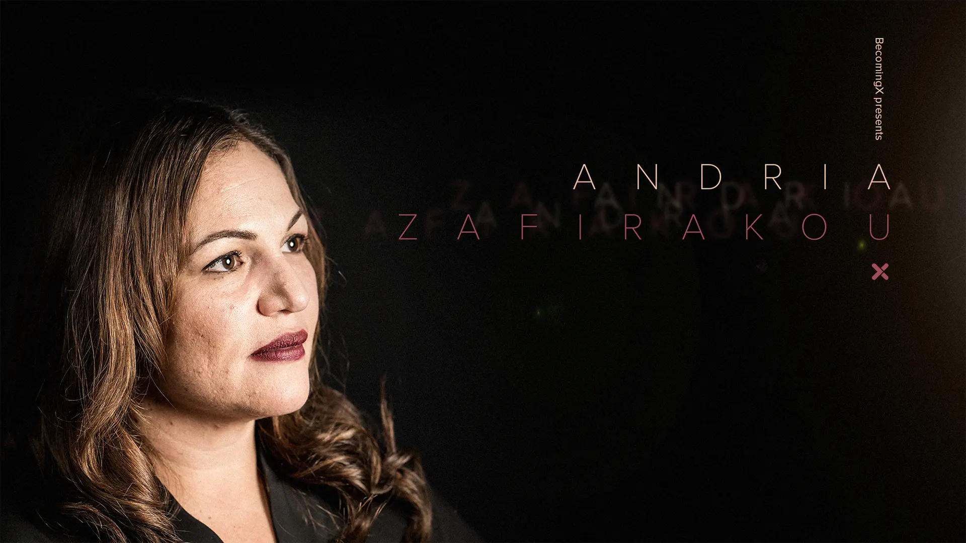 Portrait of Andria Zafirakou, winner of the Global Teacher Prize. Andria Zafirakou text overlaid.