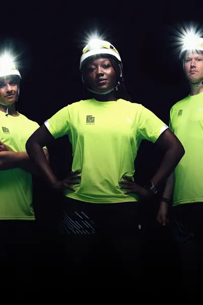 Promotional image of three runners in the World's Deepest Marathon