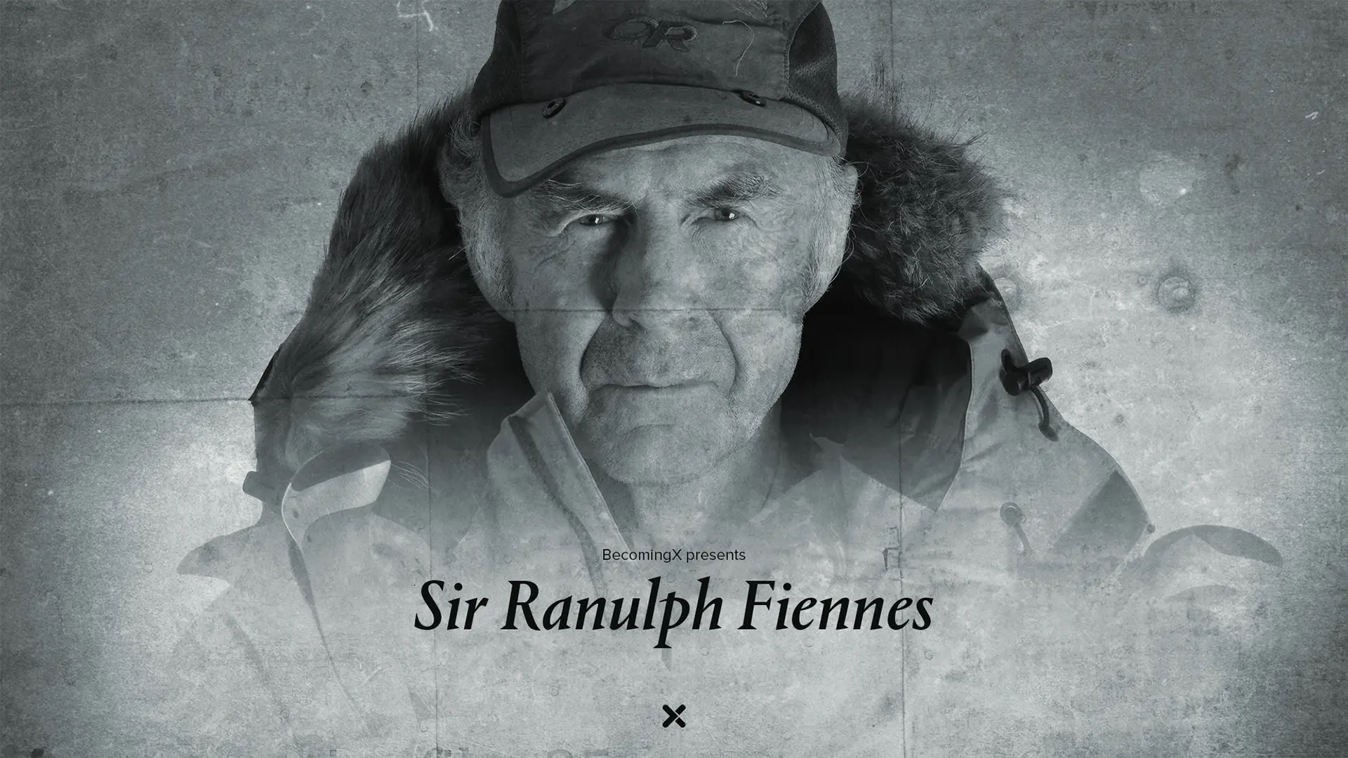 Portrait of Sir Ranulph Fiennes, the worlds greatest living explorer, in polar gear. Sir Ranulph Fiennes text overlaid.