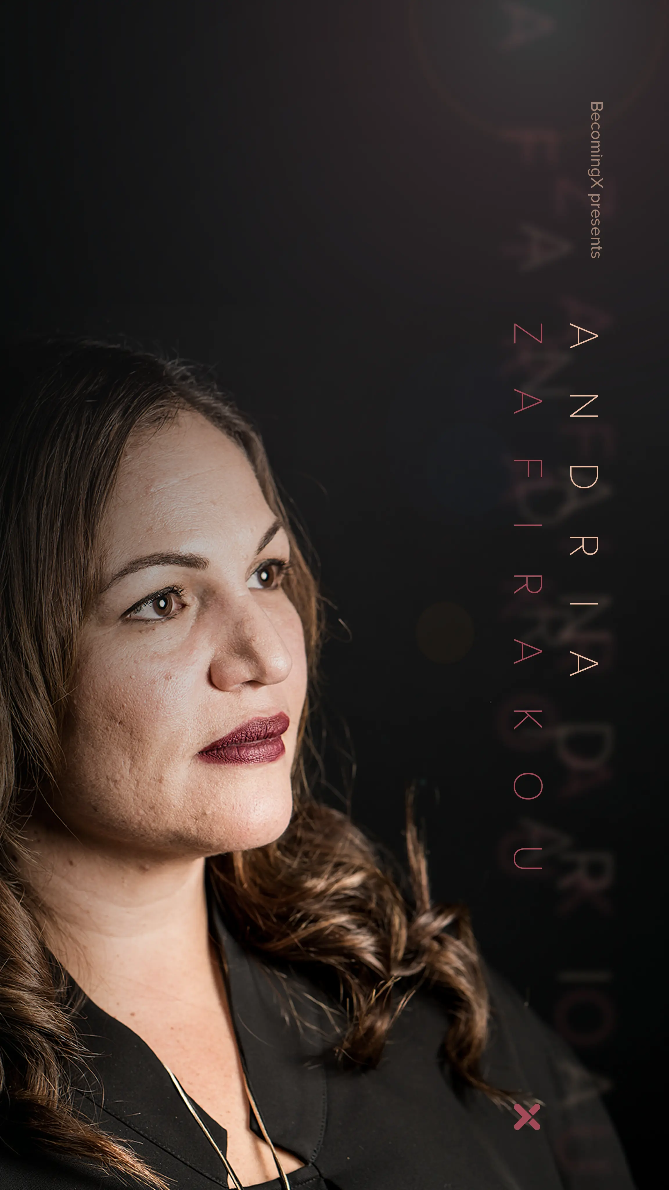 Portrait of Andria Zafirakou, winner of the Global Teacher Prize. Andria Zafirakou text overlaid.