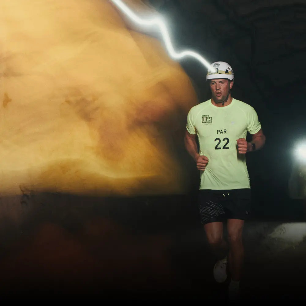 A runner competing in the World's Deepest Marathon, a BecomingX world-record event.
