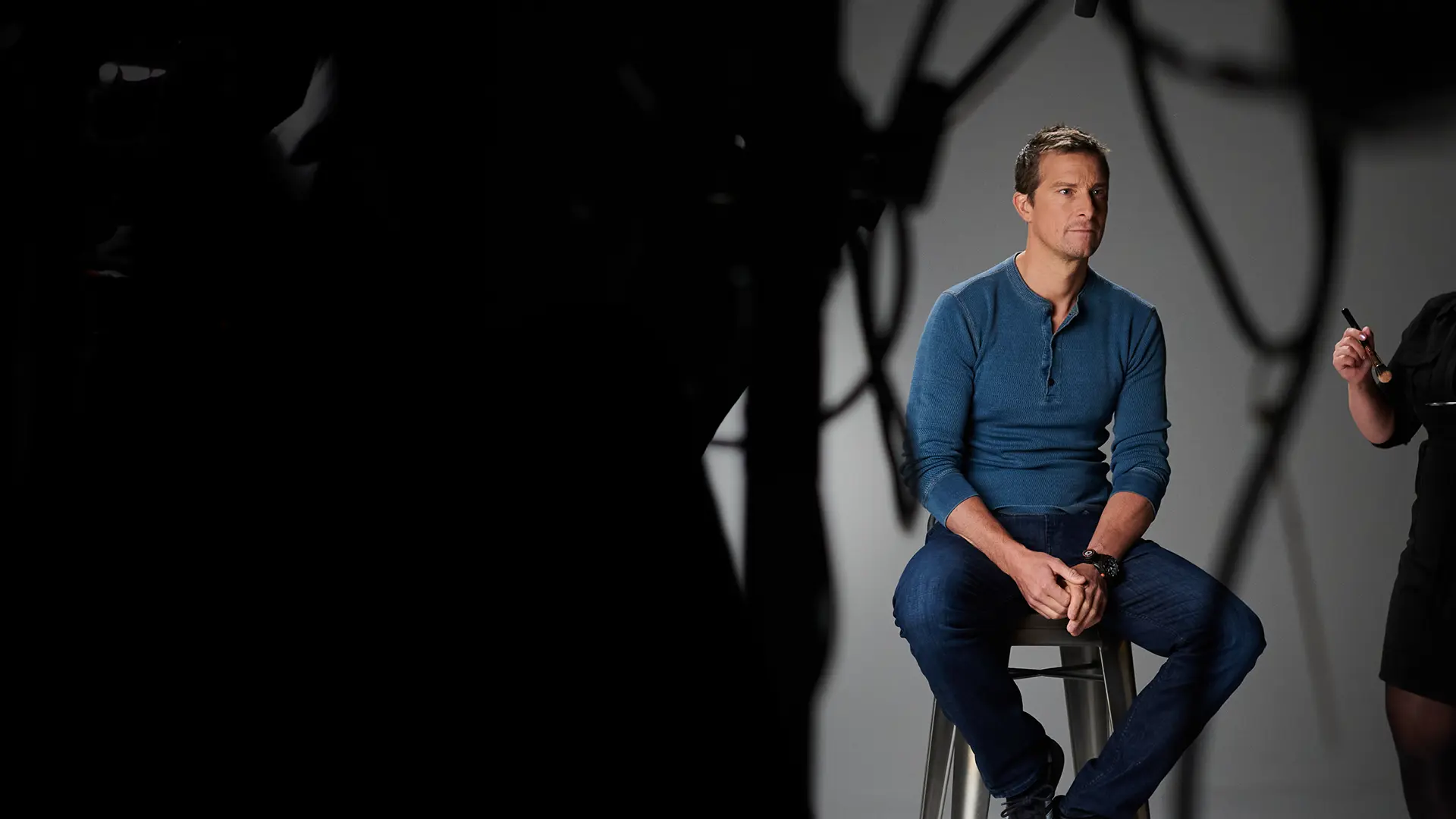 A studio with BecomingX co-founder Bear Grylls being prepared for filming