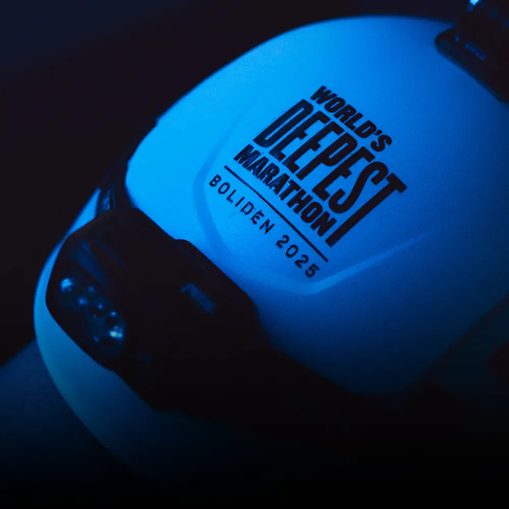 Petzl hemet with The World's Deepest Marathon logo on the front