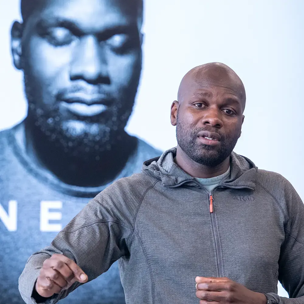 Dwayne fields delivering a presentation at a major corporate event